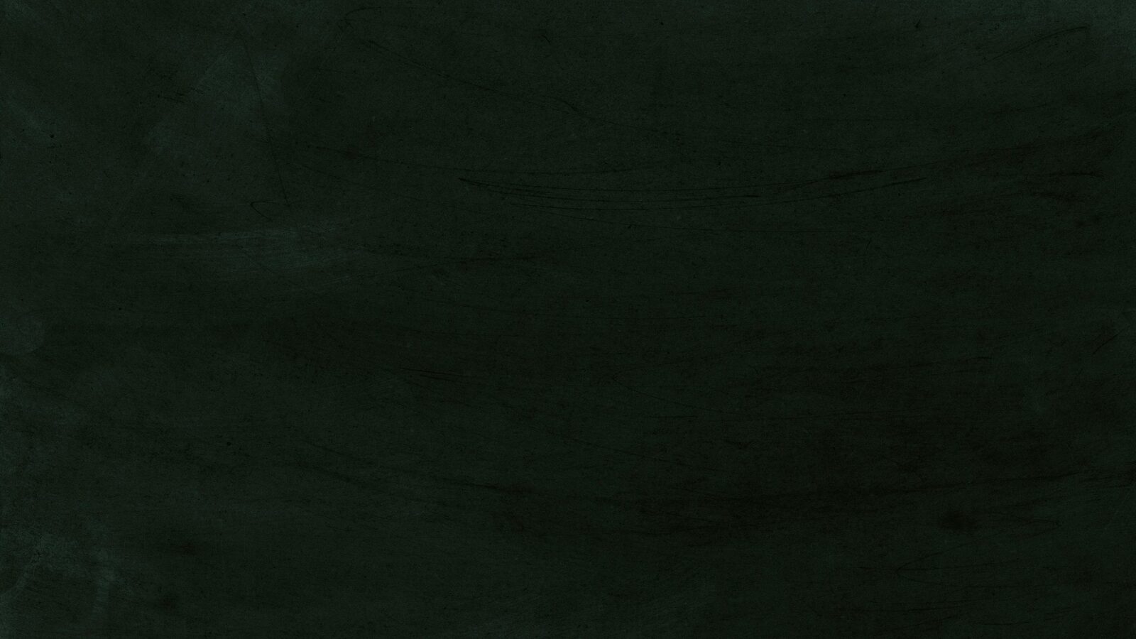 A blank green chalkboard.
